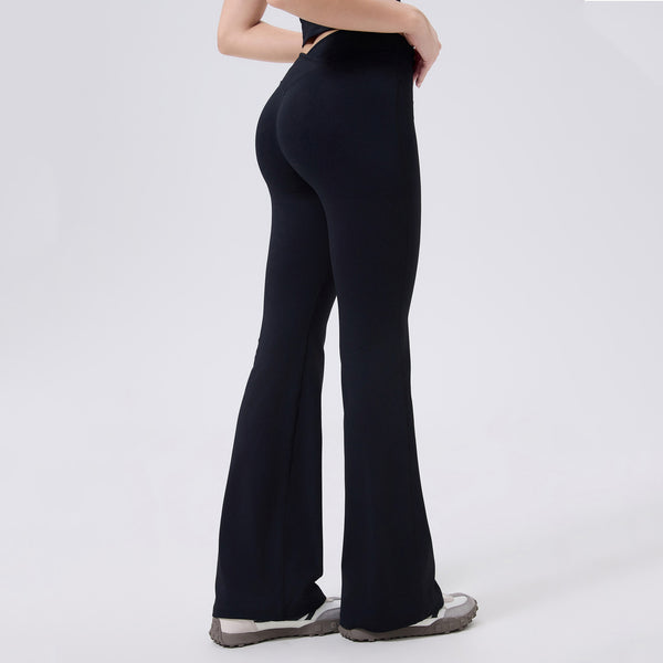 Back view of the Tummy Control Bootcut Yoga Pants in black