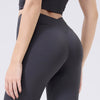 Back view of the Tummy Control Bootcut Yoga Pants in dark gray-2