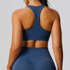 SPARK High Intensity Sports Racerback Bra for Women in blue back