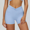 SPARK Twisted High Waist Yoga Shorts in blue