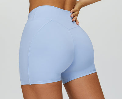 SPARK Twisted High Waist Yoga Shorts in blue back