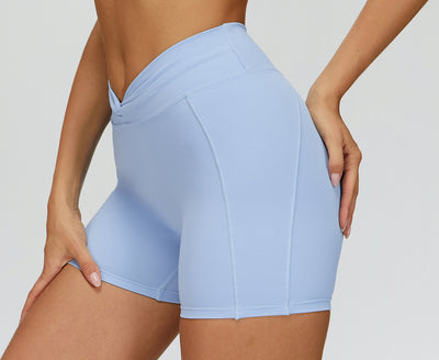 SPARK Twisted High Waist Yoga Shorts in blue side