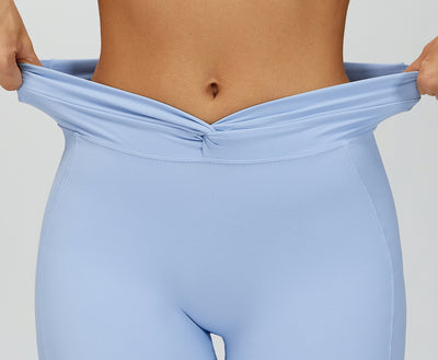 SPARK Twisted High Waist Yoga Shorts in blue waist
