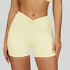 SPARK Twisted High Waist Yoga Shorts in yellow