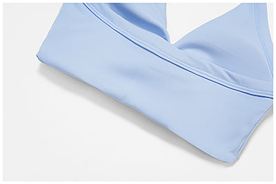 SPARK Women's Twist Halter Neck Yoga Bra in blue detail-3 band