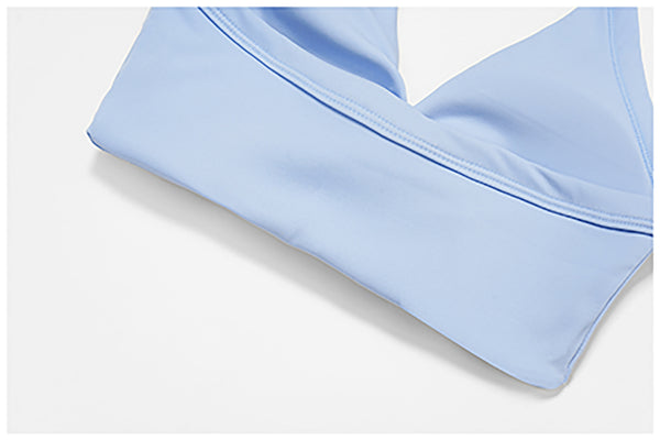 SPARK Women's Twist Halter Neck Yoga Bra in blue detail-3 band