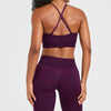 Self-adjusting seamless yoga bra & leggings in purple set back