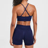 Self-adjusting seamless yoga bra & shorts in navy set  back