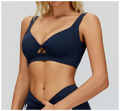 Women_s_Twist_Hollow_Open_Back_Yoga_Fitness_Bra_in navy side