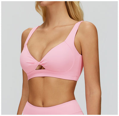 Women's Twist Hollow Open Back Yoga Fitness Bra in pink top