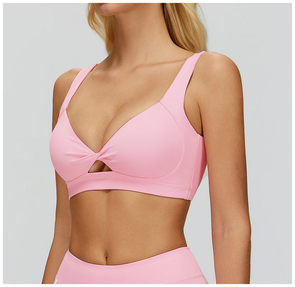 Women's Twist Hollow Open Back Yoga Fitness Bra in pink top