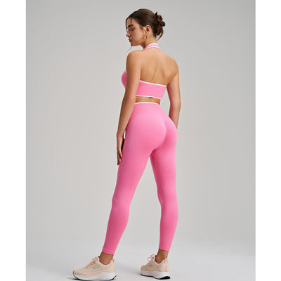 Women wearing Yoga Leggings and Sports Bra Set. in pink back